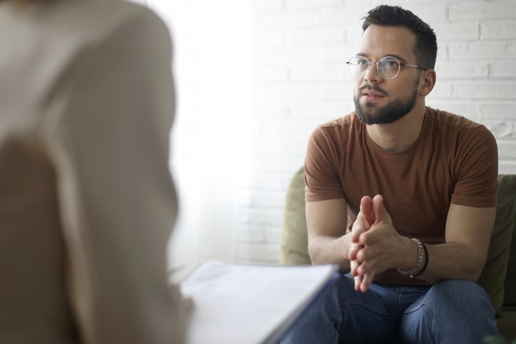 Psychotherapy Young man talking to a psychiatrist. About 30 years old, Caucasian male.