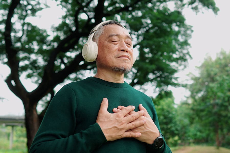 Man with Headphones and Smiling
